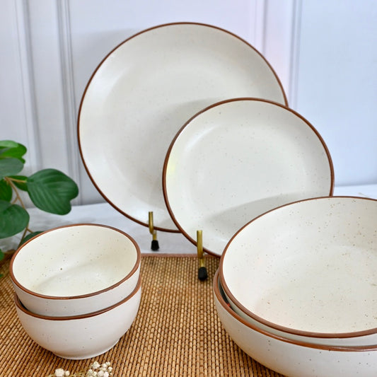 set of seven white ceramic dinner set from saabi house