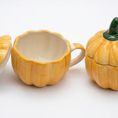 Ceramic pumpkin-shaped mug on a white background